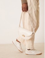 interchangeable curve shoulder and crossbody bag with lock detail in white
