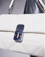 goma crossbody bag with chain strap in white and silver