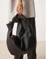 knotted strap shoulder bag in black