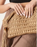 straw clutch bag with open weave and tassel and bead detail