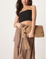 straw clutch bag with open weave and tassel and bead detail