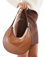 interchangeable shoulder and clutch scoop cookie bag in tan