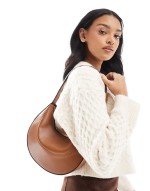 interchangeable shoulder and clutch scoop cookie bag in tan