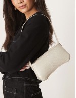 textured curved based shoulder bag in stone
