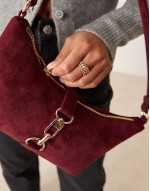 faux suede dog clip shoulder bag in burgundy