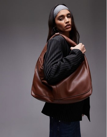 the big sling faux leather bag in brown