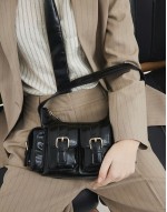 buckle strap utility shoulder bag in black
