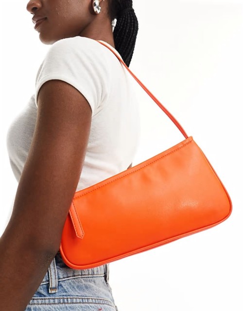 asymmetric buckle shoulder bag in orange