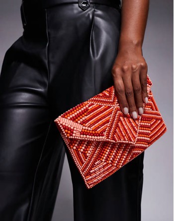 patterned beaded envelope clutch bag in red