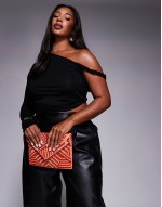 patterned beaded envelope clutch bag in red