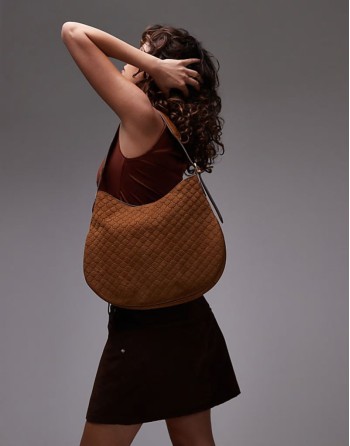 embossed monogram leather bag in brown