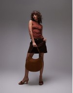 embossed monogram leather bag in brown