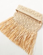oversized straw clutch with fringe detail in natural